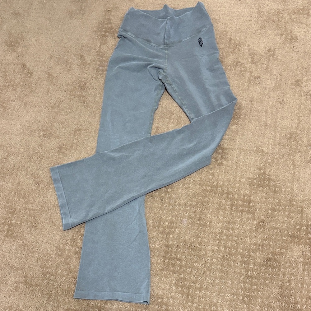 Free People Movement. Never worn.  Light grey flared legging.
